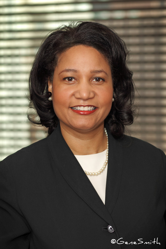 Attractive female executive posed for headshot in conference room philadelphia, PA.