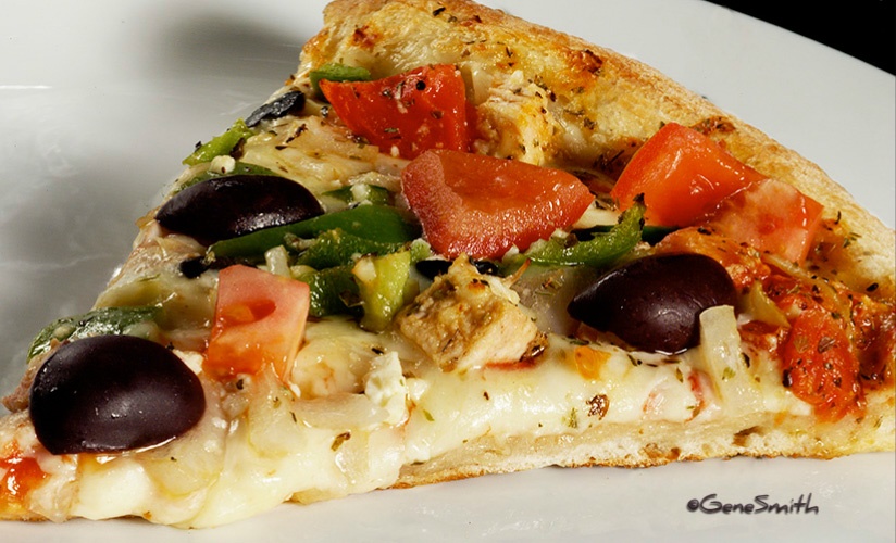 Pizza Slice wth vegetable toppings