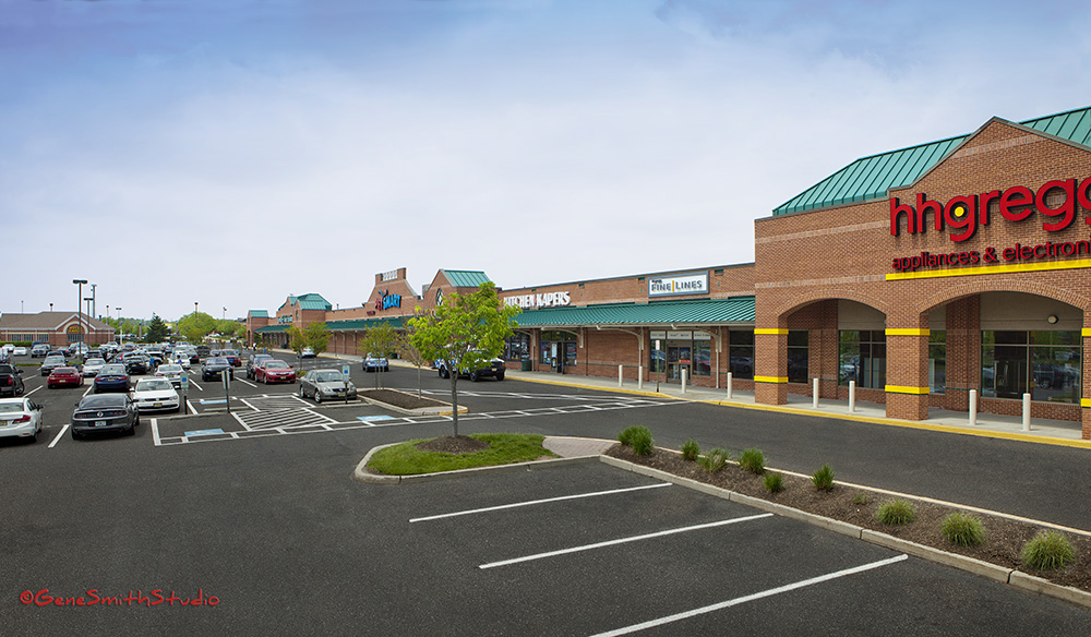 Shopping Center photographed for commercial real estate group in Chicago. I used my unique overhead view technology to get this 'almost rooftop' view. This equipment does not rely on trucks, ladders, lifts or drones that require special permits and can damage property. To see more of this unique photography check out my Landscape Architecture section.