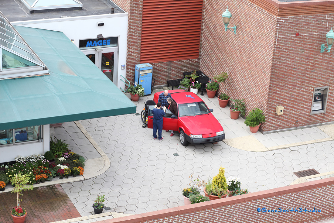 Physical therapists help patient learn to do everyday tasks we all take for granted on MAGEE Rehab’s outdoor deck with ATM, automobile for ingress egress, and other everyday human/machine interfaces.