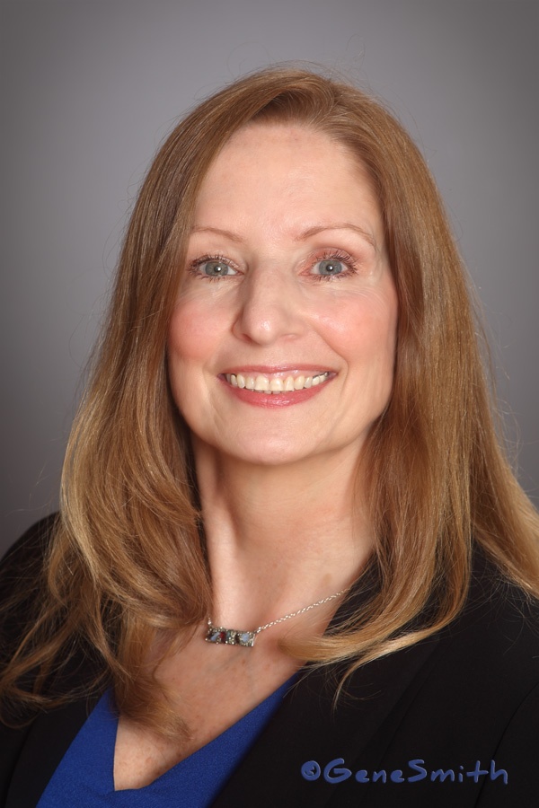 Professional Headshot of attractive woman for business by Gene Smith